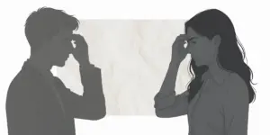 向かい合って額に手を当てる男女二人のシルエットイラスト